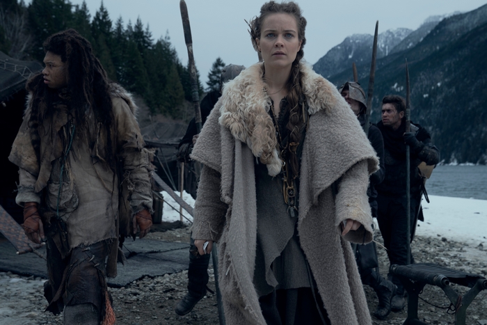 Hera Hilmar in a fur coat with companions in a cold landscape