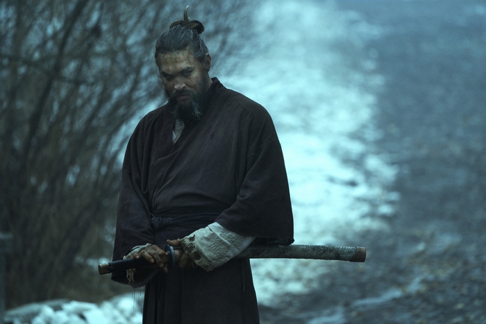 Jason Momoa as a somber samurai in a snowy landscape