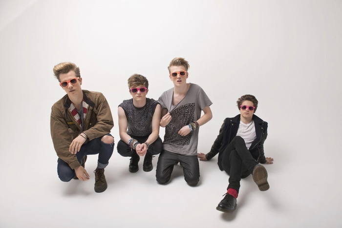 The Vamps posing with sunglasses