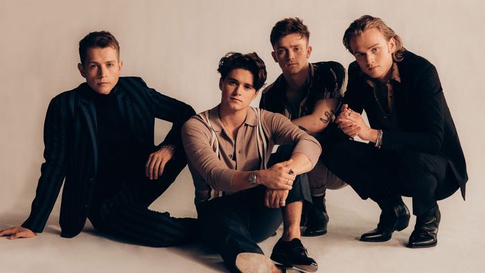 The Vamps band members posing stylishly