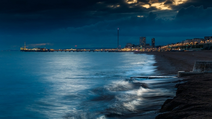 England Coastal City at Night with Pier