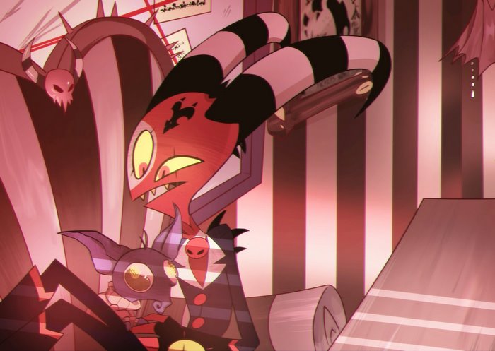 Helluva Boss Blitzo looking angry holding small creature