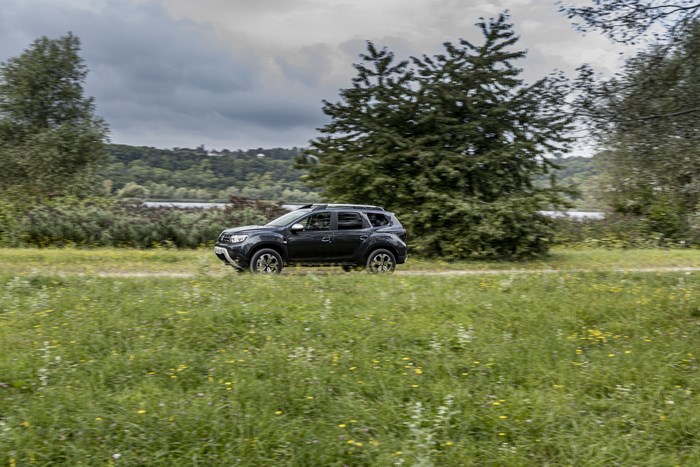 Dacia Duster ECO SUV driving in nature