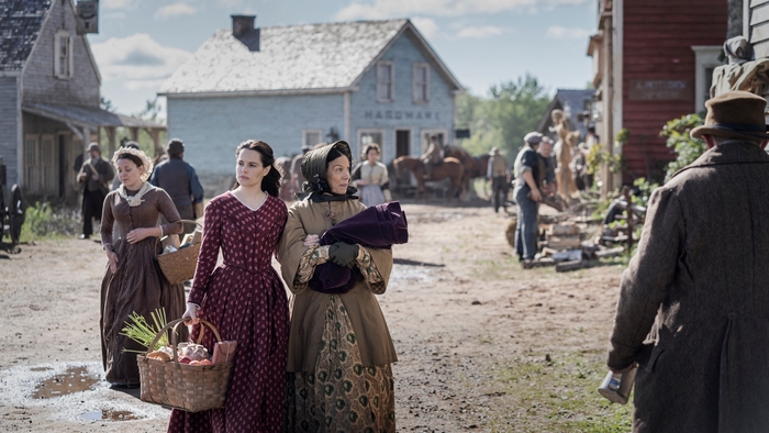 Emily Hampshire and woman with baby in Chapelwaite