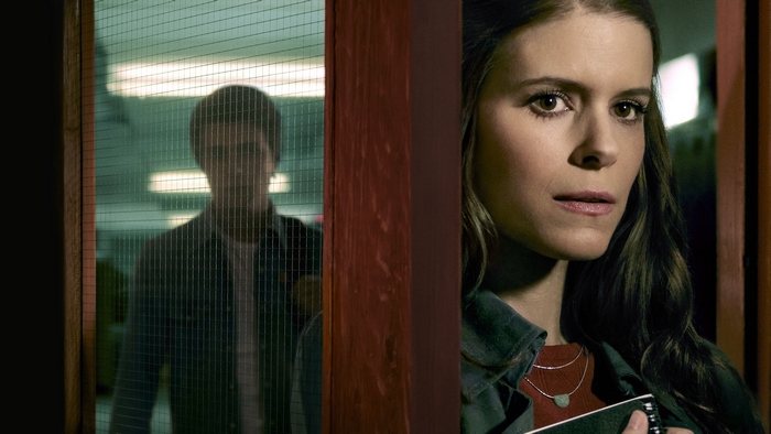 Kate Mara looking at blurred man in A Teacher
