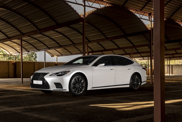 White Lexus LS 500 Luxury Car under a metal roof