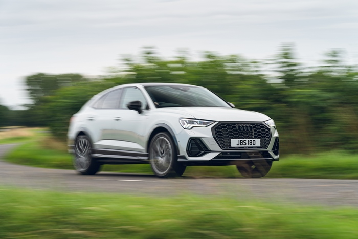 Luxury Audi Q3 Sportback S Line SUV in motion