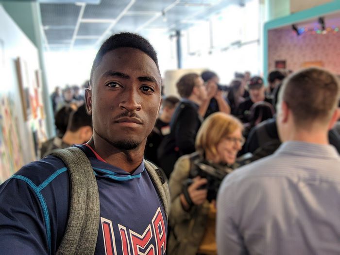 Marques Brownlee taking a selfie in a crowd