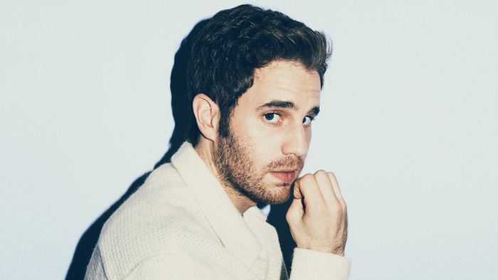 Ben Platt looking over shoulder