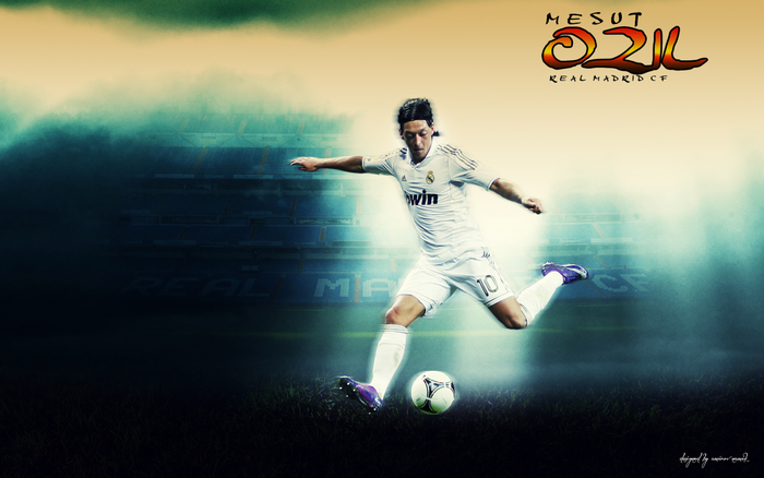 Mesut Özil Real Madrid C.F. kicking soccer ball