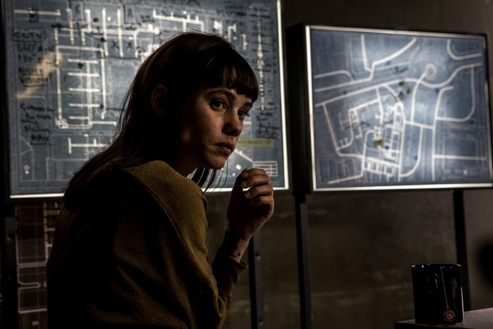 Astrid Bergès-Frisbey studying maps in The Vault