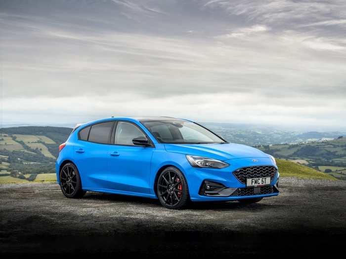 Blue Ford Focus ST on a scenic hill