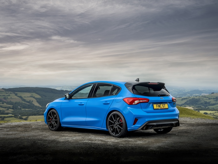 Blue Ford Focus ST on a scenic overlook