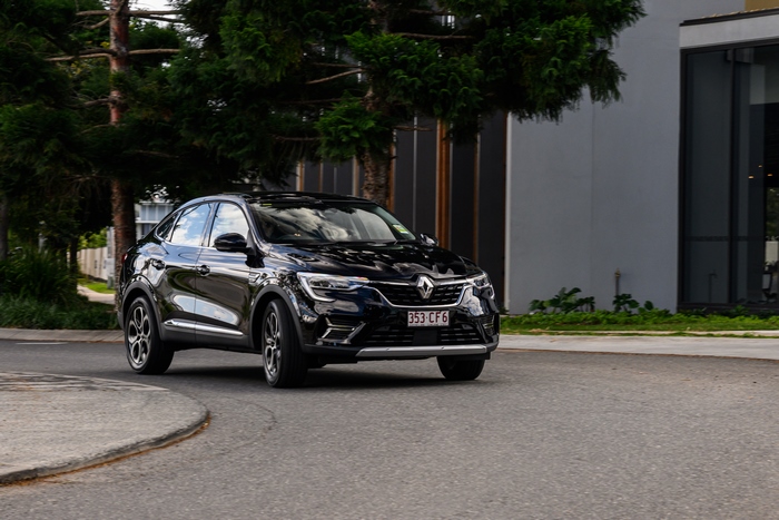Black Renault Arkana SUV on road