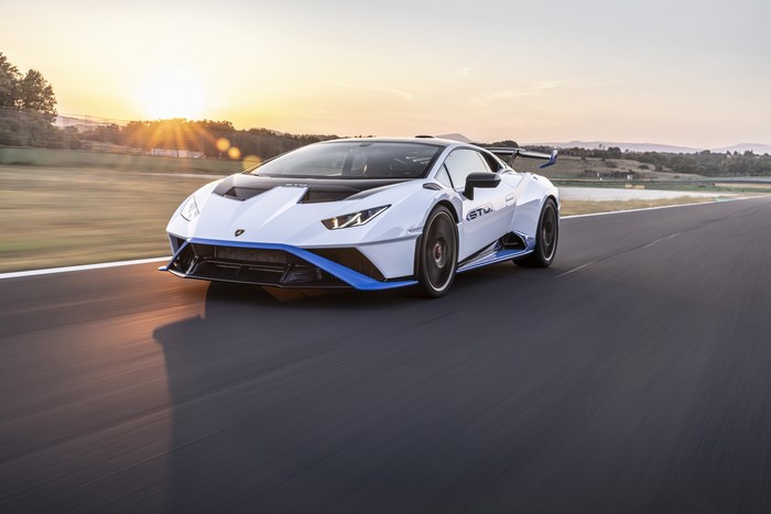 White Lamborghini Huracán STO Supercar on Track at Sunset