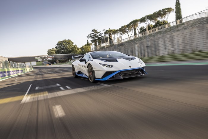 Lamborghini Huracán STO supercar racing on track
