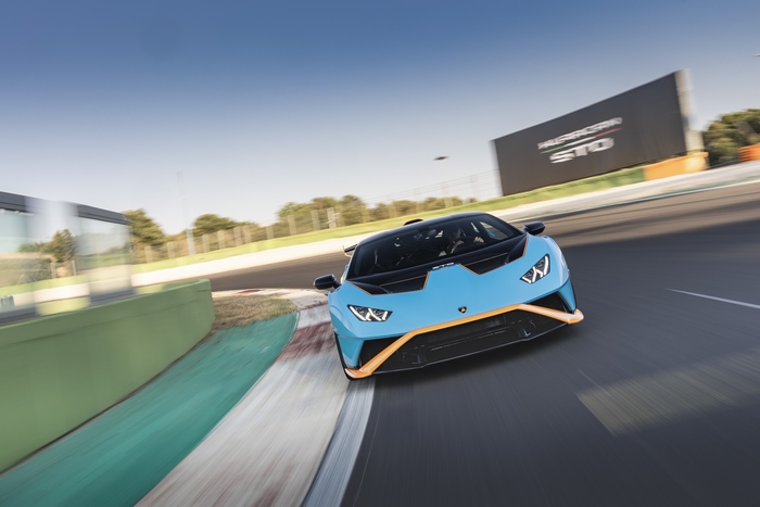 Blue Lamborghini Huracán STO Supercar Cornering on Track