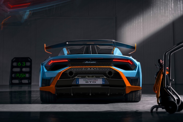 Blue and orange Lamborghini Huracán STO supercar rear view