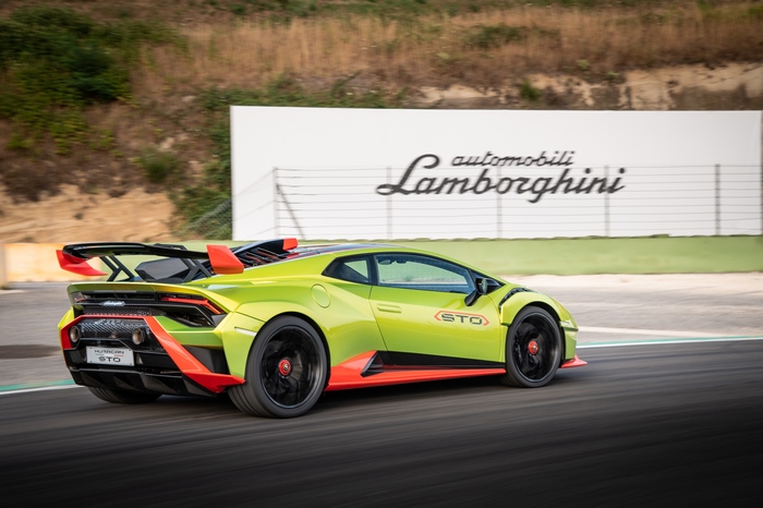 Green Lamborghini Huracán STO Supercar on Track