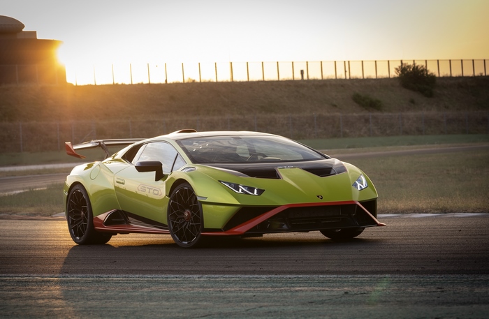 Green Lamborghini Huracán STO Supercar at Sunset