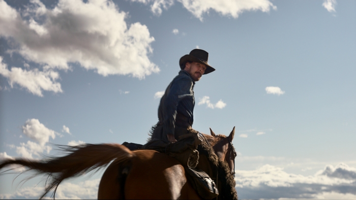 Benedict Cumberbatch on horseback in The Power of the Dog