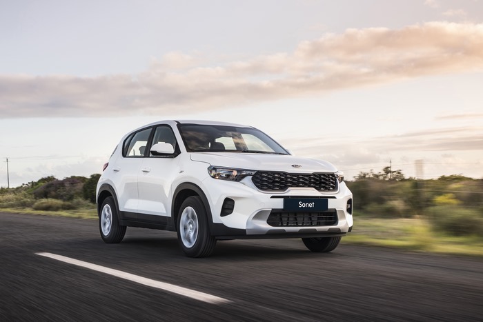 Kia Sonet LX SUV driving on road