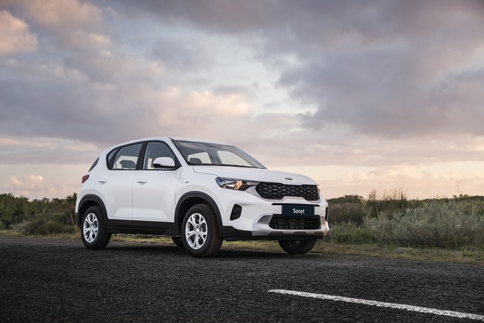 White Kia Sonet LX SUV parked on a road