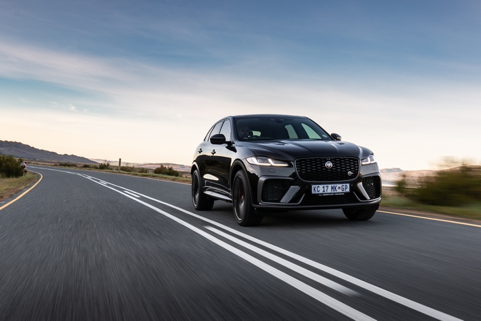 2021 Black Jaguar F-Pace SVR SUV driving on road