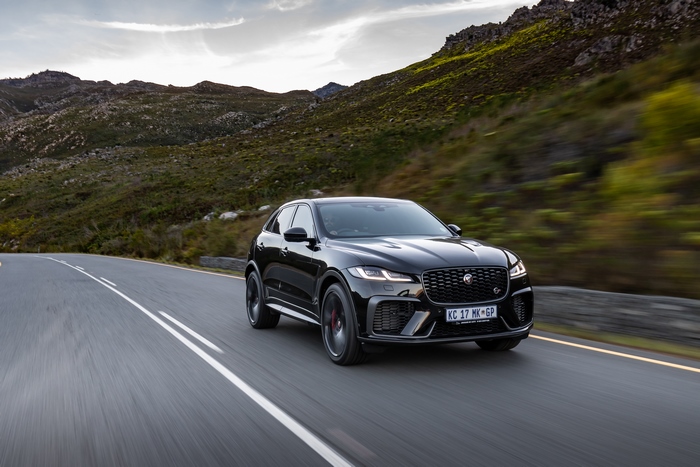Black 2021 Jaguar F-Pace SVR SUV on mountain road