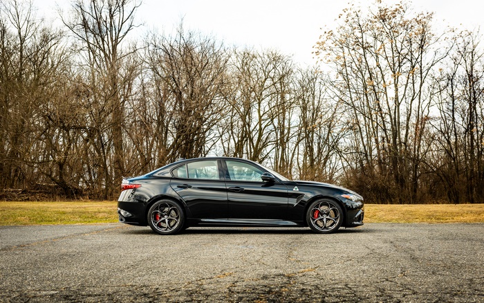 Black Alfa Romeo Giulia Quadrifoglio Sport Car on Road