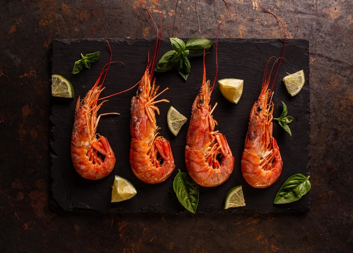 Gourmet cooked shrimp with lime and basil