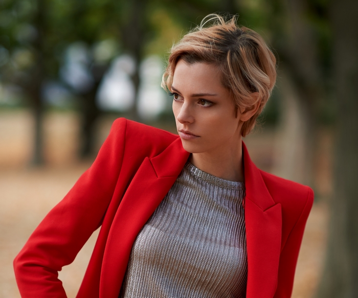 Model with Short Blonde Hair in Red Blazer