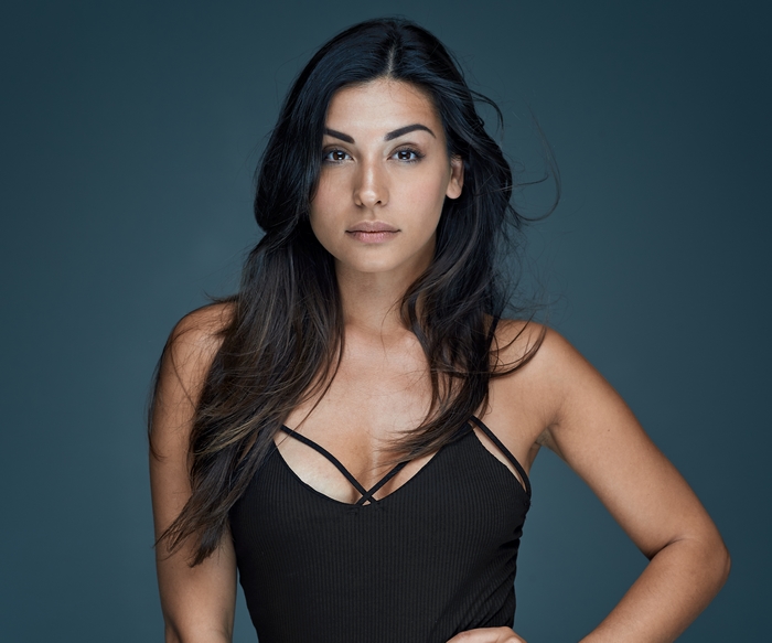 Portrait of Woman with Black Hair and Brown Eyes