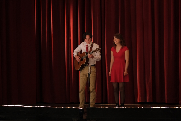 Emilia Jones and guitarist on stage in CODA