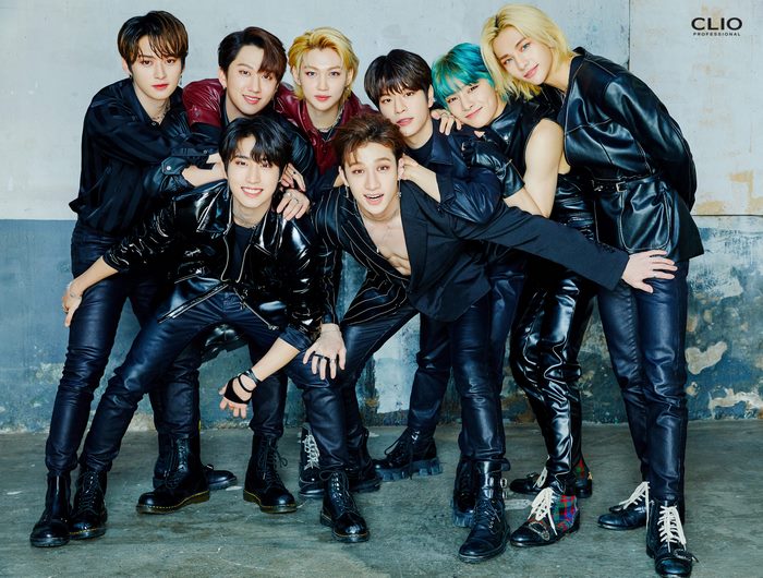 Stray Kids Vibrant Group Portrait in Leather