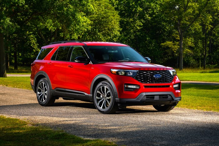 Red Ford Explorer ST-Line SUV on a path