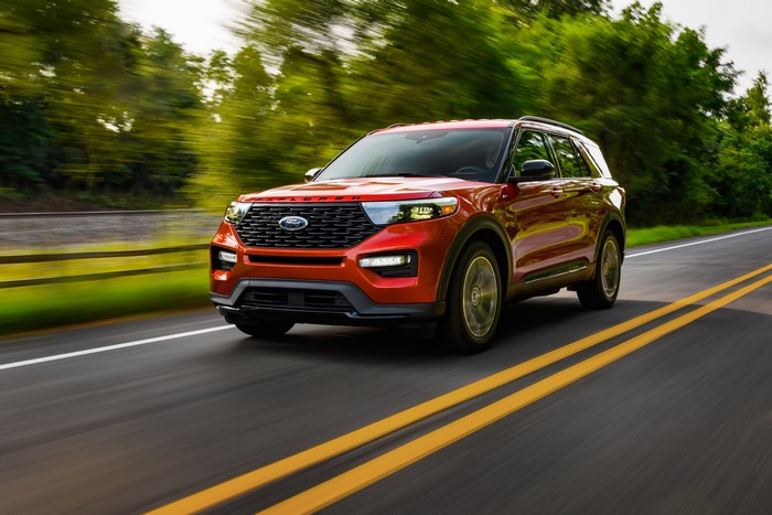 Red Ford Explorer ST-Line SUV in motion