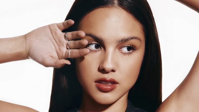Olivia Rodrigo close-up with hand near face