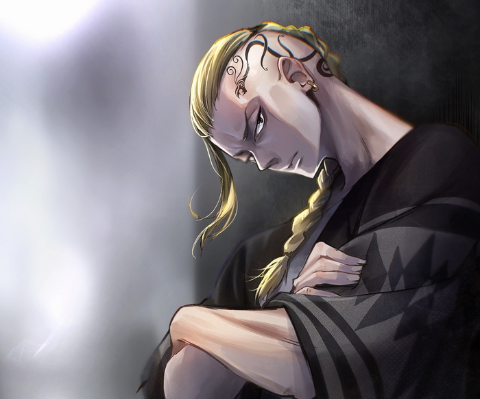 Pensive Ken Ryuguji with head tattoos and braid