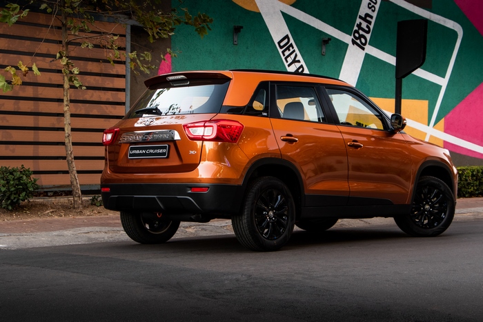 Orange Toyota Urban Cruiser SUV parked 4K