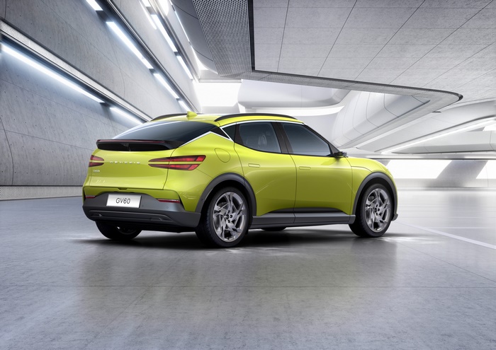 Lime Green Genesis GV60 SUV in Modern Garage