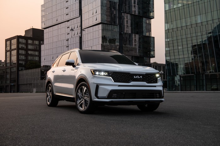 White Kia Sorento PHEV SUV in urban setting