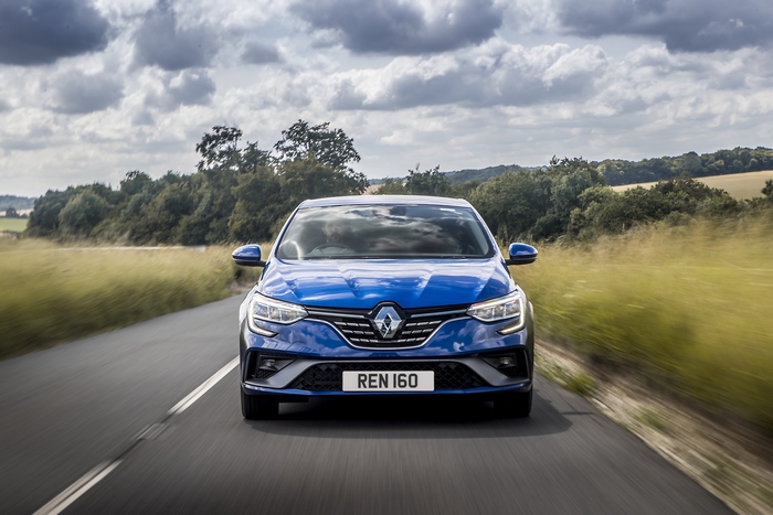 Blue Renault Mégane E-TECH electric car on road