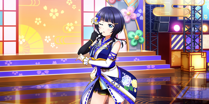 Karin Asaka winking and shushing in blue costume