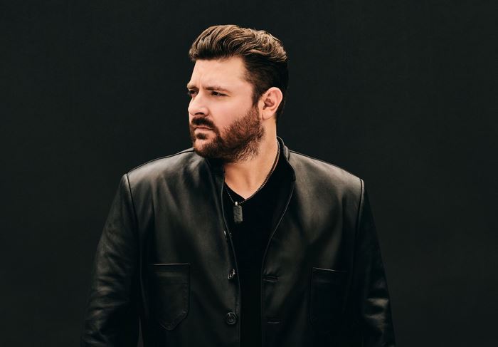 Chris Young in black leather jacket portrait