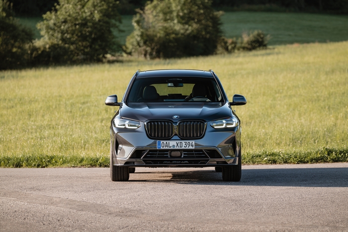 BMW Alpina XD3 SUV parked on a rural road