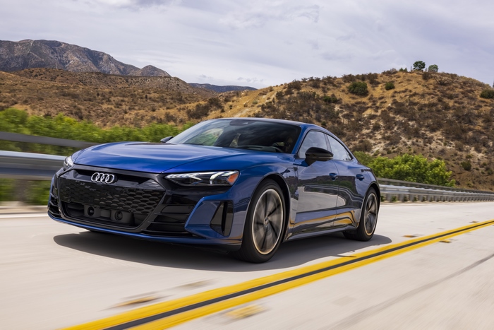 Blue Audi e-tron GT Quattro Electric Car on a Mountain Road