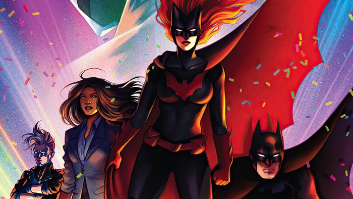 Batwoman, Batman and allies in a colorful DC celebration