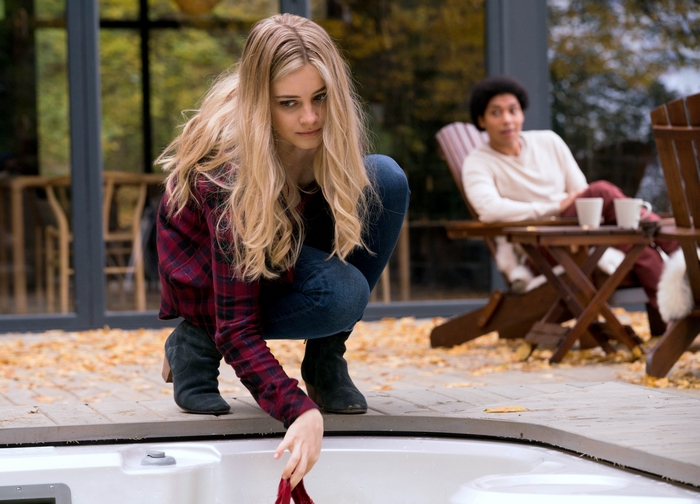 Josephine Langford crouching by hot tub in After We Fell