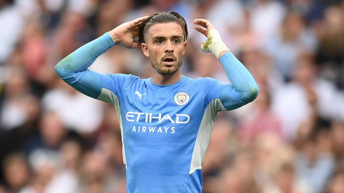 Jack Grealish in Manchester City kit looking frustrated